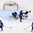 GRAND FORKS, NORTH DAKOTA - APRIL 23: The puck gets past Finland's Ukko-Pekka Luukkonen #1 for a USA third period goal while Finland's Robin Salo #4, Markus Nurmi #27, Markus Niemelainen #21 and USA's Kailer Yamamoto #23 looks on during semifinal round action at the 2016 IIHF Ice Hockey U18 World Championship. (Photo by Matt Zambonin/HHOF-IIHF Images)

